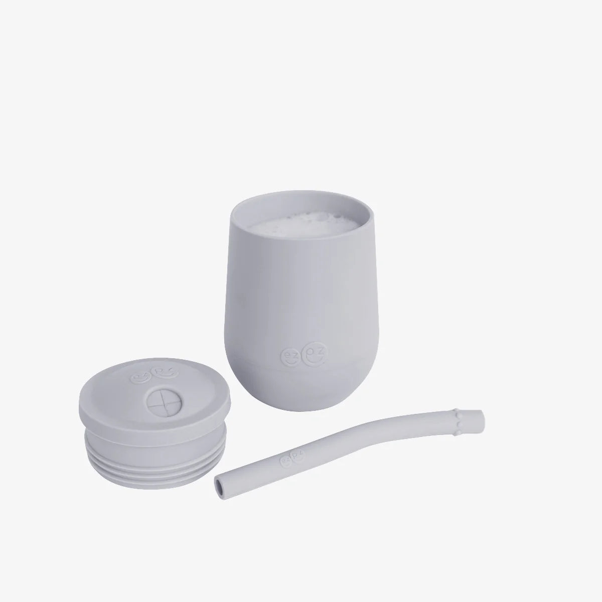 ezpz Mini Cup + Straw Training System – Silikonska čaša za djecu sa slamkom